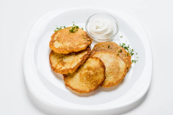 Potato pancakes on plate — Stock Photo, Image