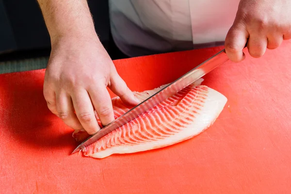 Chef cutting fish — Stock Photo, Image