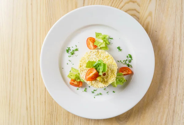 Layered salad on plate — Stock Photo, Image