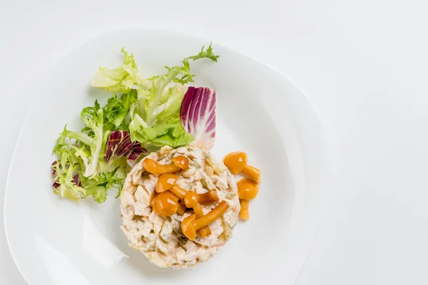 Salad with mushrooms on white — Stock Photo, Image