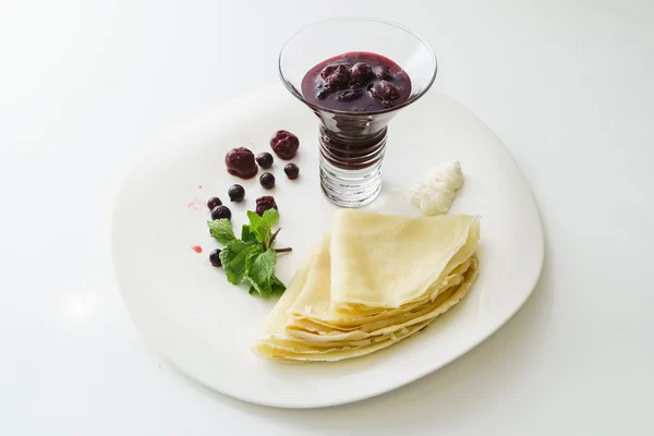 Baked pancakes with jam — Stock Photo, Image