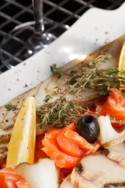 Fish delicacies on festive table — Stock Photo, Image