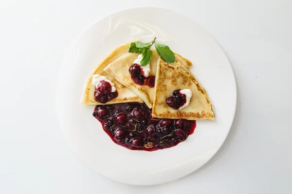 Baked pancakes with jam — Stock Photo, Image