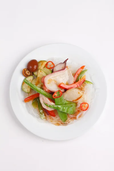 Octopus with vegetables on plate — Stock Photo, Image