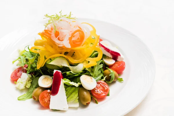 Salad with eggs on plate — Stock Photo, Image