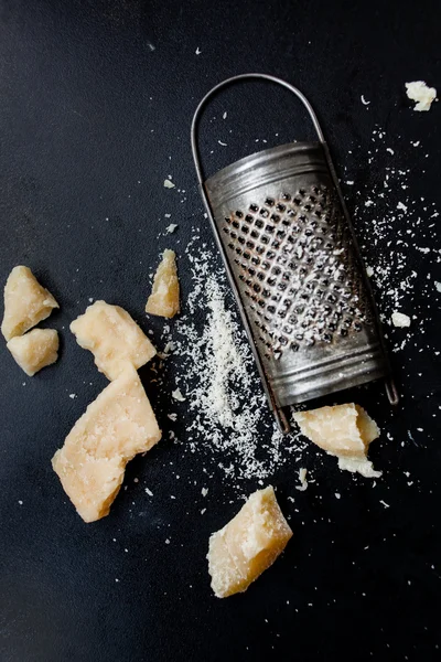 Parmesan cheese with grater — Stock Photo, Image