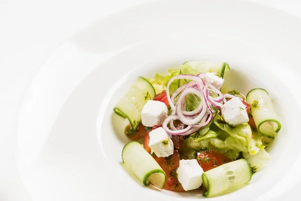 Greek salad on plate — Stock Photo, Image