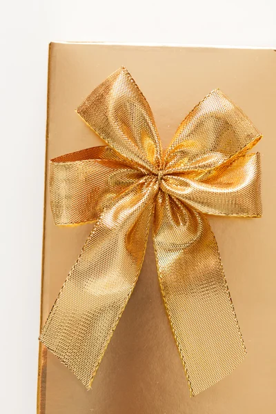 Present with golden bow — Stock Photo, Image