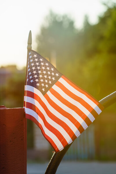 american flag on sunset