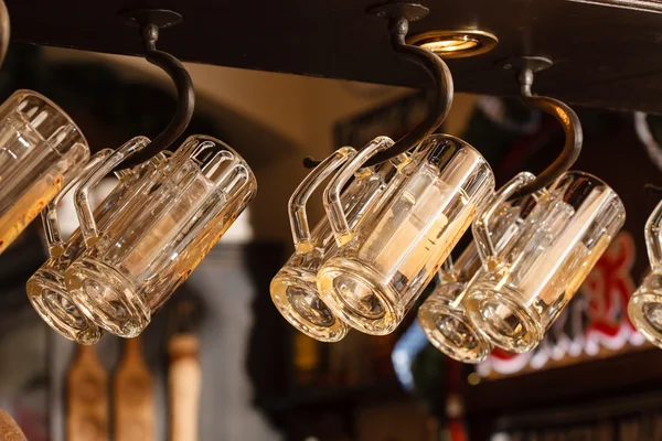 Hanging beer glasses — Stock Photo, Image