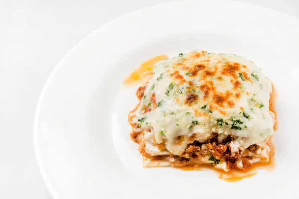 Fresh lasagna on plate — Stock Photo, Image