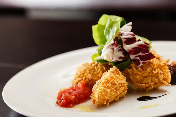 Chicken nuggets with salad — Stock Photo, Image