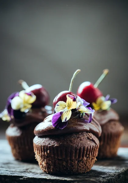 Cupcakes decorated with cherry — Stock Photo, Image