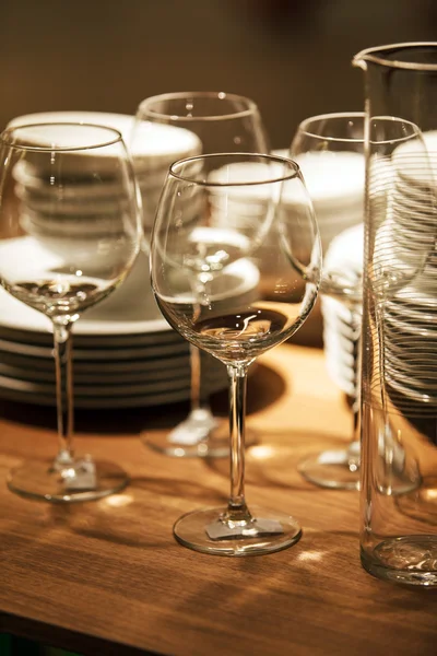 Empty glasses and plates — Stock Photo, Image