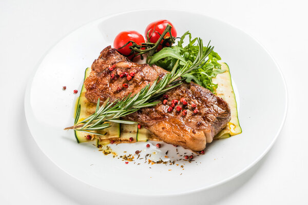 steak with vegetables on plate