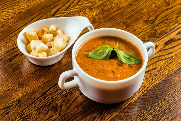 Tomato soup on plate — Stock Photo, Image