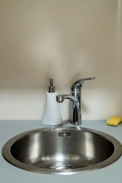 Modern faucet in kitchen — Stock Photo, Image