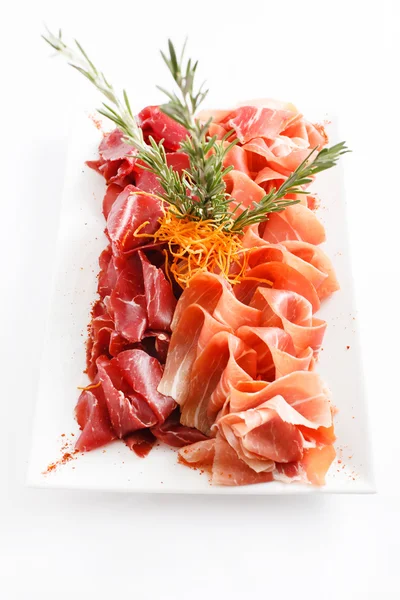 Meat appetizer on plate — Stock Photo, Image