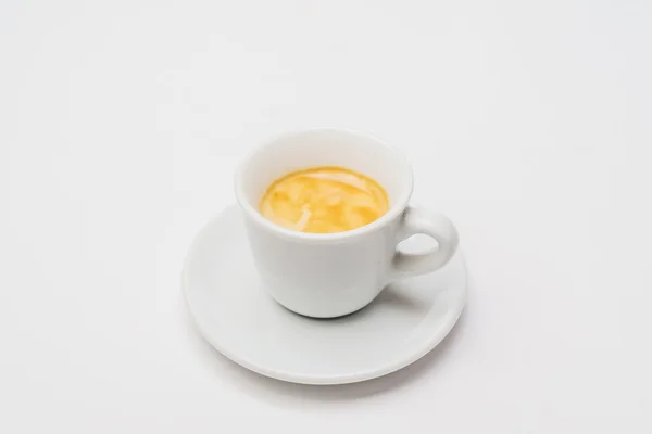 Coffee in cup on plate — Stock Photo, Image