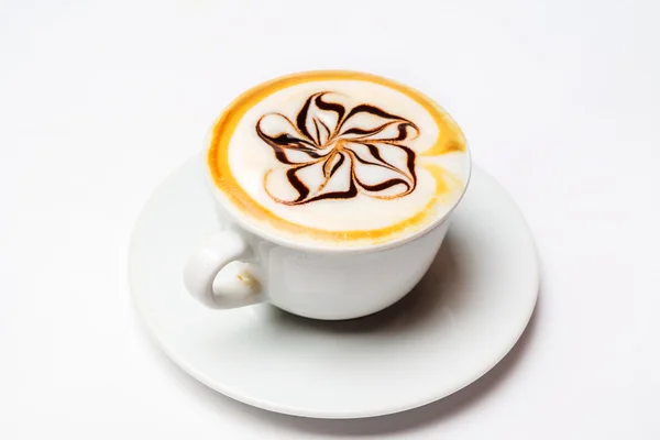 Cappuccino in tazza sul piatto — Foto Stock