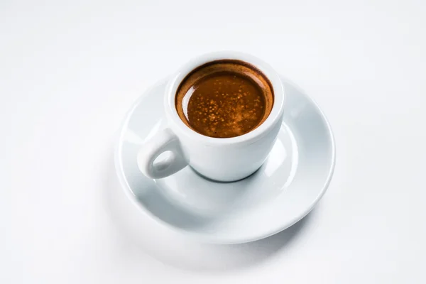 Cup of coffee on plate — Stock Photo, Image