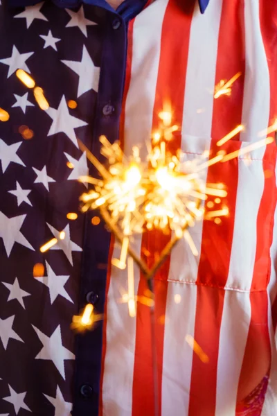 Woman in usa bloose with sparkler — Stock Photo, Image