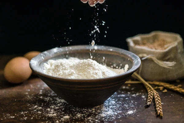 Spelt flour on black — Stock Photo, Image
