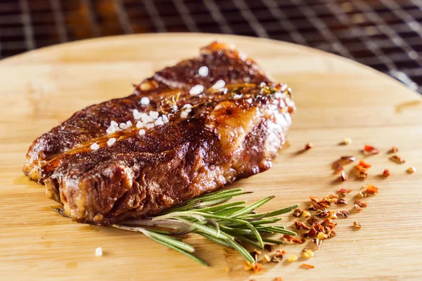 Tasty steak with sauce — Stock Photo, Image