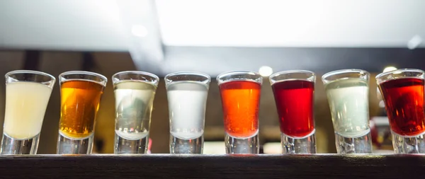 Alcohol drinks in glasses — Stock Photo, Image