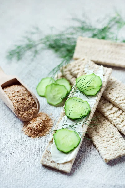 Stack of crispbreads with cream — Stock Photo, Image