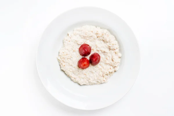 Oat porridge with strawberry — Stock Photo, Image