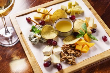 Assorted cheese plate clipart