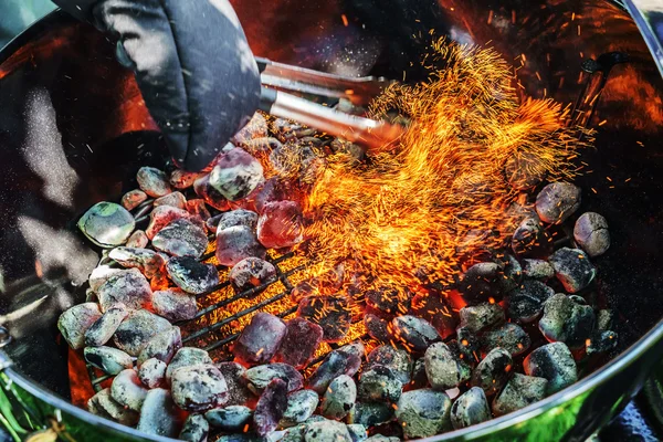 Sparks coming out of barbecue — Stock Photo, Image