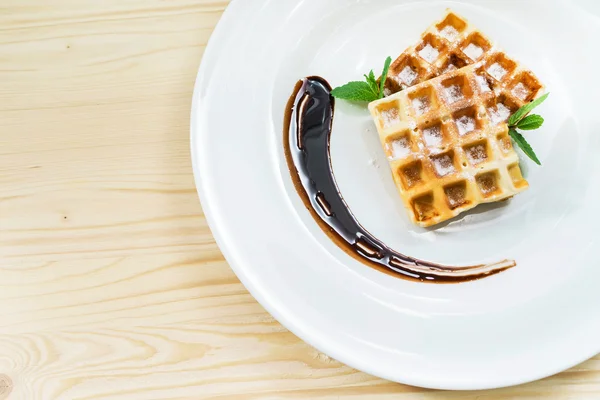 Tasty waffles with chocolate — Stock Photo, Image