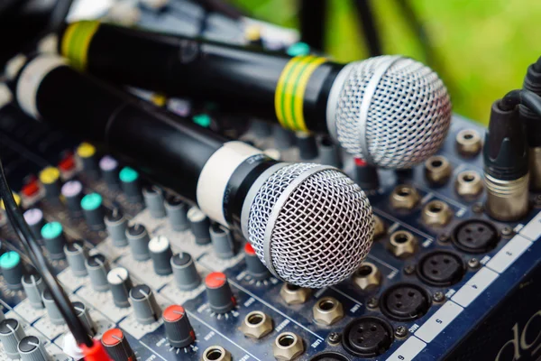 Amplifier and pair of microphones — Stock Photo, Image