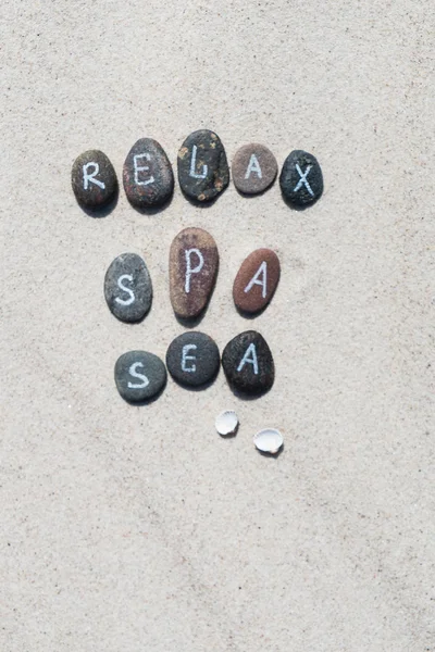 pebble stones with lettering