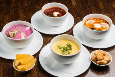 Gourmet soups in bowls clipart