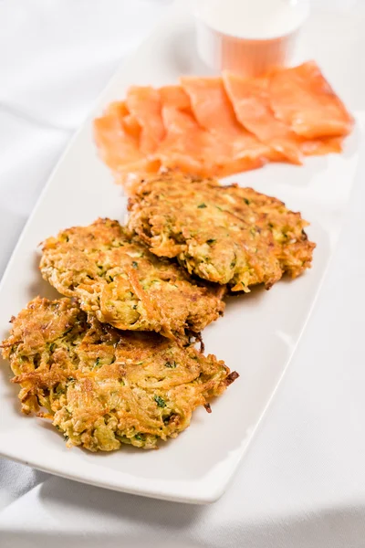 Vegetable pancakes with salmon — Stock Photo, Image