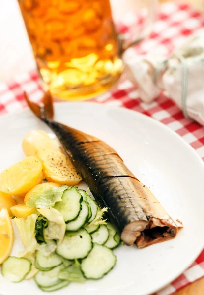 Glass of beer and food — Stock Photo, Image