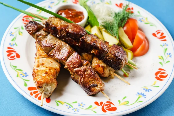 Kebab with potatoes and salad — Stock Photo, Image