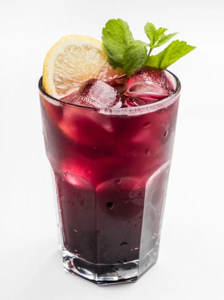 Glass of colorful cocktail — Stock Photo, Image