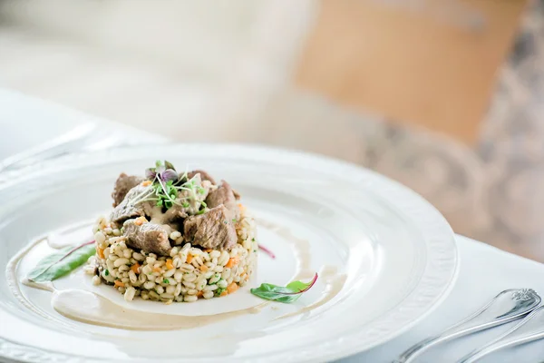 Portion of barley with meat — Stock Photo, Image