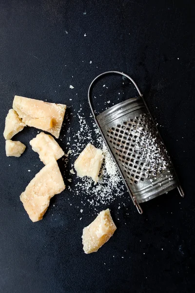 Parmesan cheese with grater — Stock Photo, Image