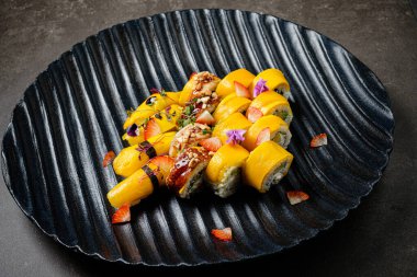 sushi with mango and eel
