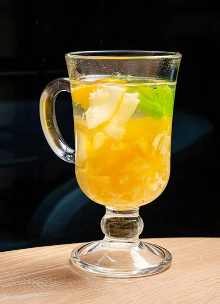 Traditional green tea or iced tea with lemon juice