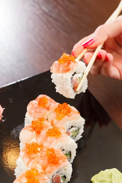 Sushi no bar — Fotografia de Stock