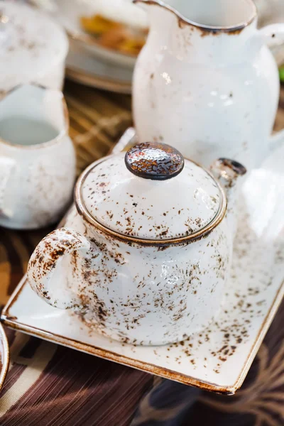 Teapot on table — Stock Photo, Image