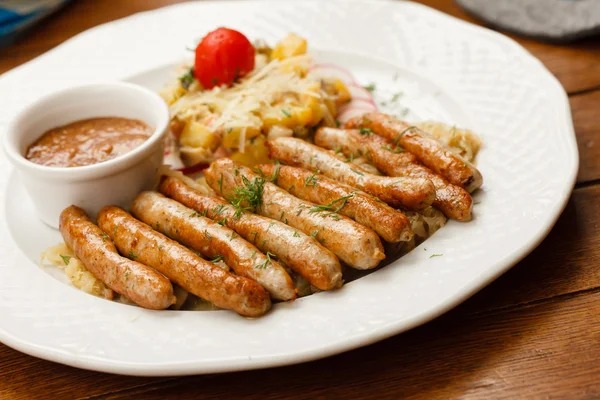 Sausage with cabbage — Stock Photo, Image