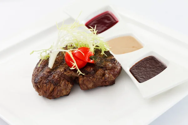 Steak with sauces — Stock Photo, Image