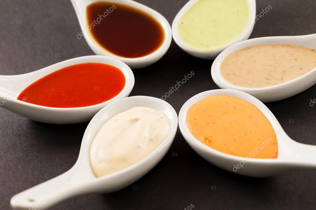 Different kinds of sauce Stock Photo by ©Shebeko 54999109